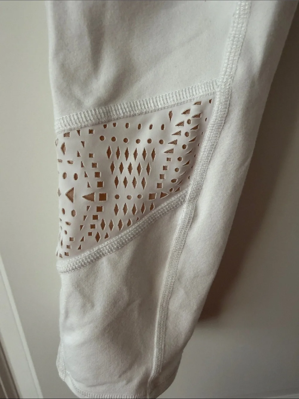 ALO Yoga White 3/4 length leggings with cutouts